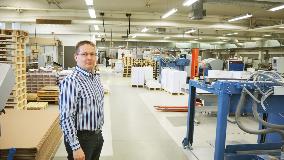 Sales manager Matti Heinämäki presenting the new premises.