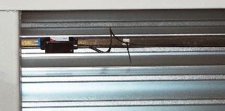 There are a total of four snow load measuring units, radio boxes attached to the underside of the roof. These sensors are located right next to the highest part of the building, where snow banks can form.